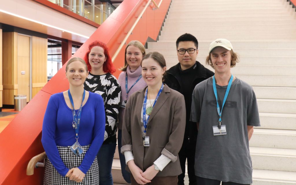 Photo of Lisa and her research group at the University of Auckland