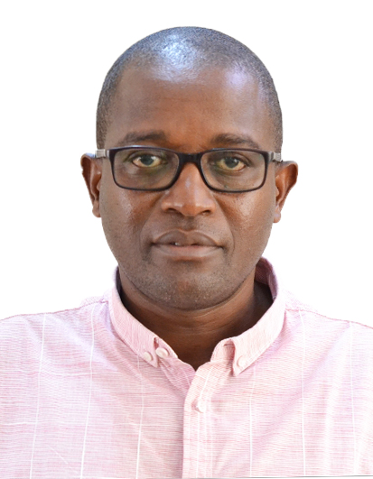 Photo of Timothy Biswick wearing a pink shirt with a white background